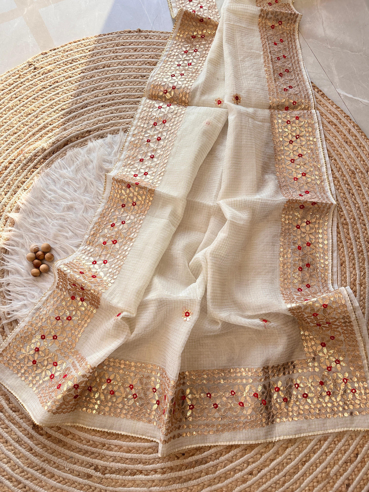 White Kota Doria Saree with Gold Sequin Border and Embroidered Buttis | Kaya Kalpo