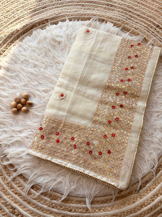 White Kota Doria Saree with Gold Sequin Border and Embroidered Buttis | Kaya Kalpo