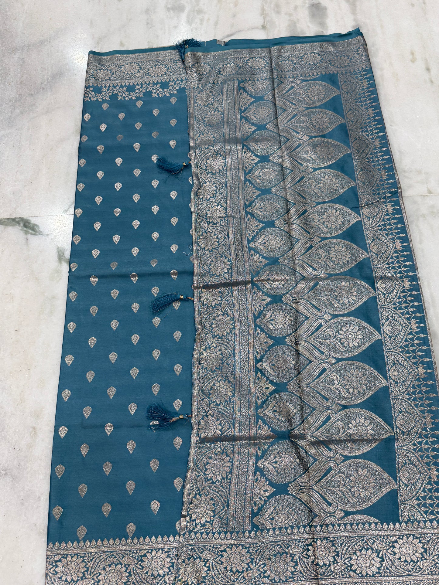 Kaya Kalpo Teal Blue Satin Weave Saree | Gold Zari Booti Body & Large Leaf Woven Pallu | Festive & Bridal Wear