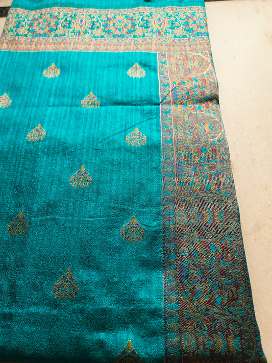 Premium Khaddi Silk Saree in Turquoise with Zari Buttis & Multicolor Kani Border