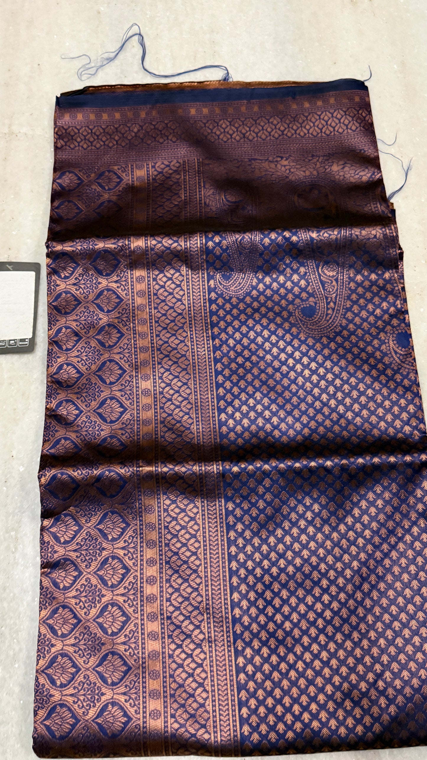 Shop charcoal grey Kanchipuram silk saree with rich maroon zari border. Elegant, luxurious & perfect for weddings and festive wear. Includes blouse piece.