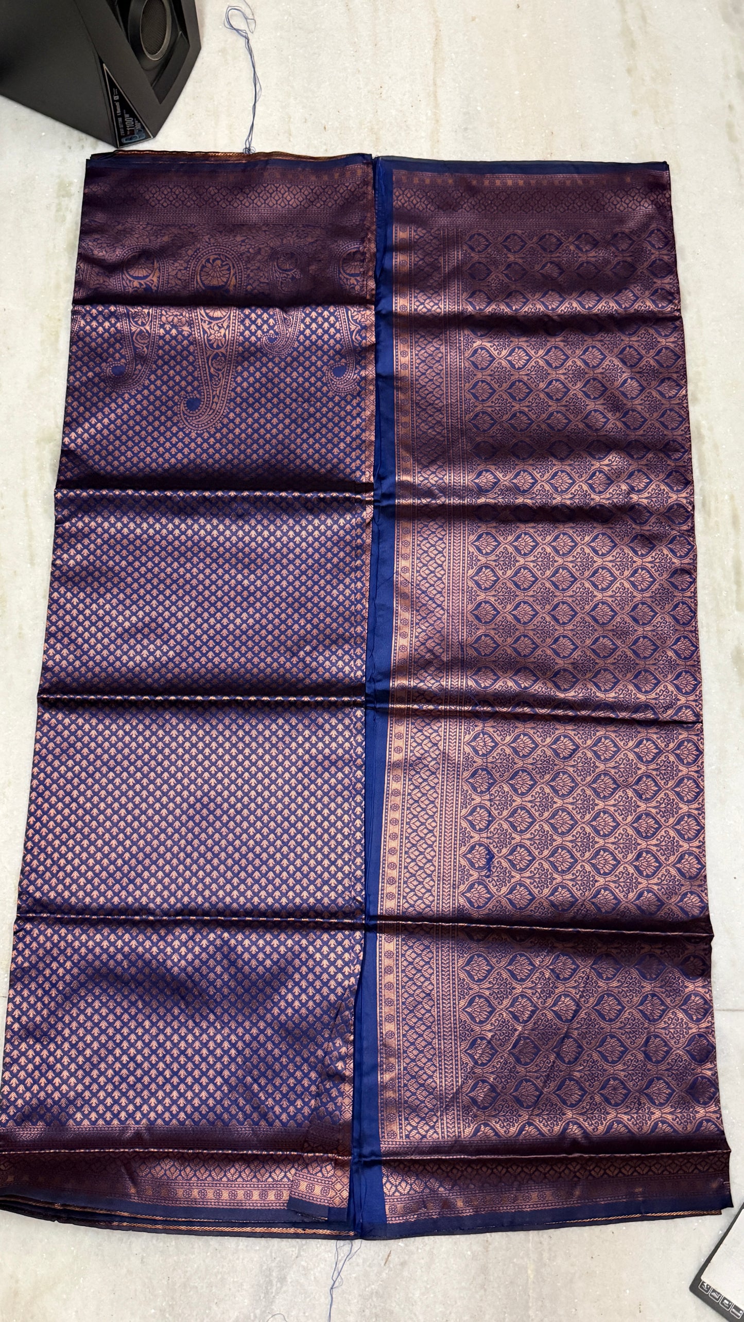 Shop charcoal grey Kanchipuram silk saree with rich maroon zari border. Elegant, luxurious & perfect for weddings and festive wear. Includes blouse piece.