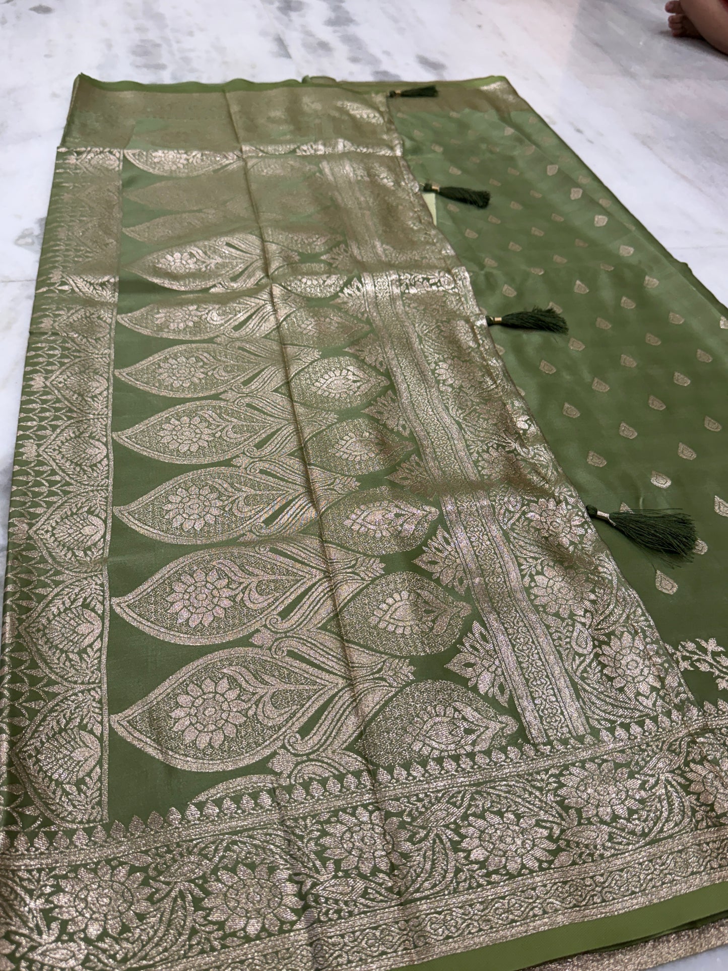 Kaya Kalpo Olive Green Satin Saree | Gold Zari Booti Body & Large Leaf Woven Pallu | Festive & Bridal Wear