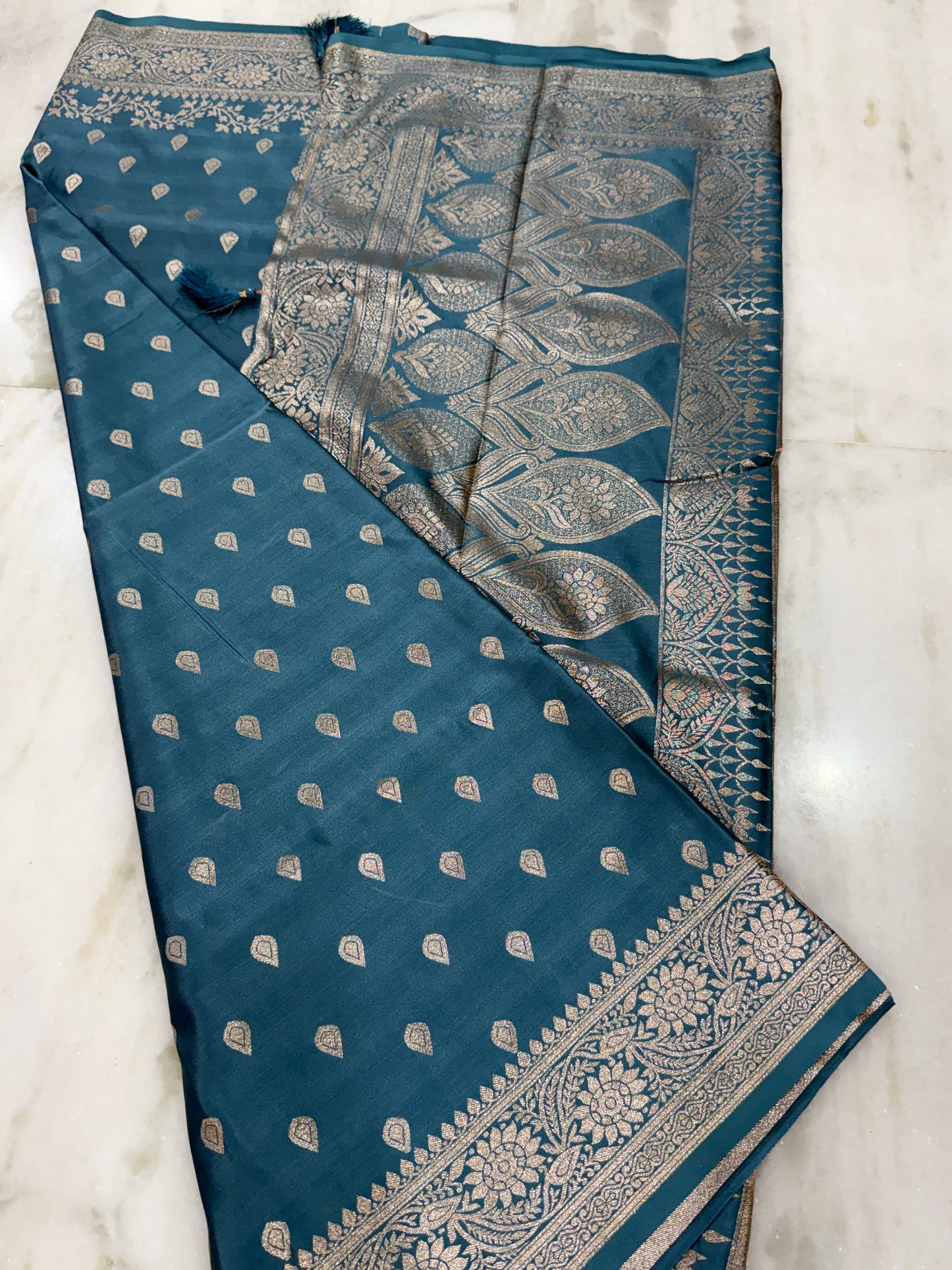 Kaya Kalpo Teal Blue Satin Weave Saree | Gold Zari Booti Body & Large Leaf Woven Pallu | Festive & Bridal Wear