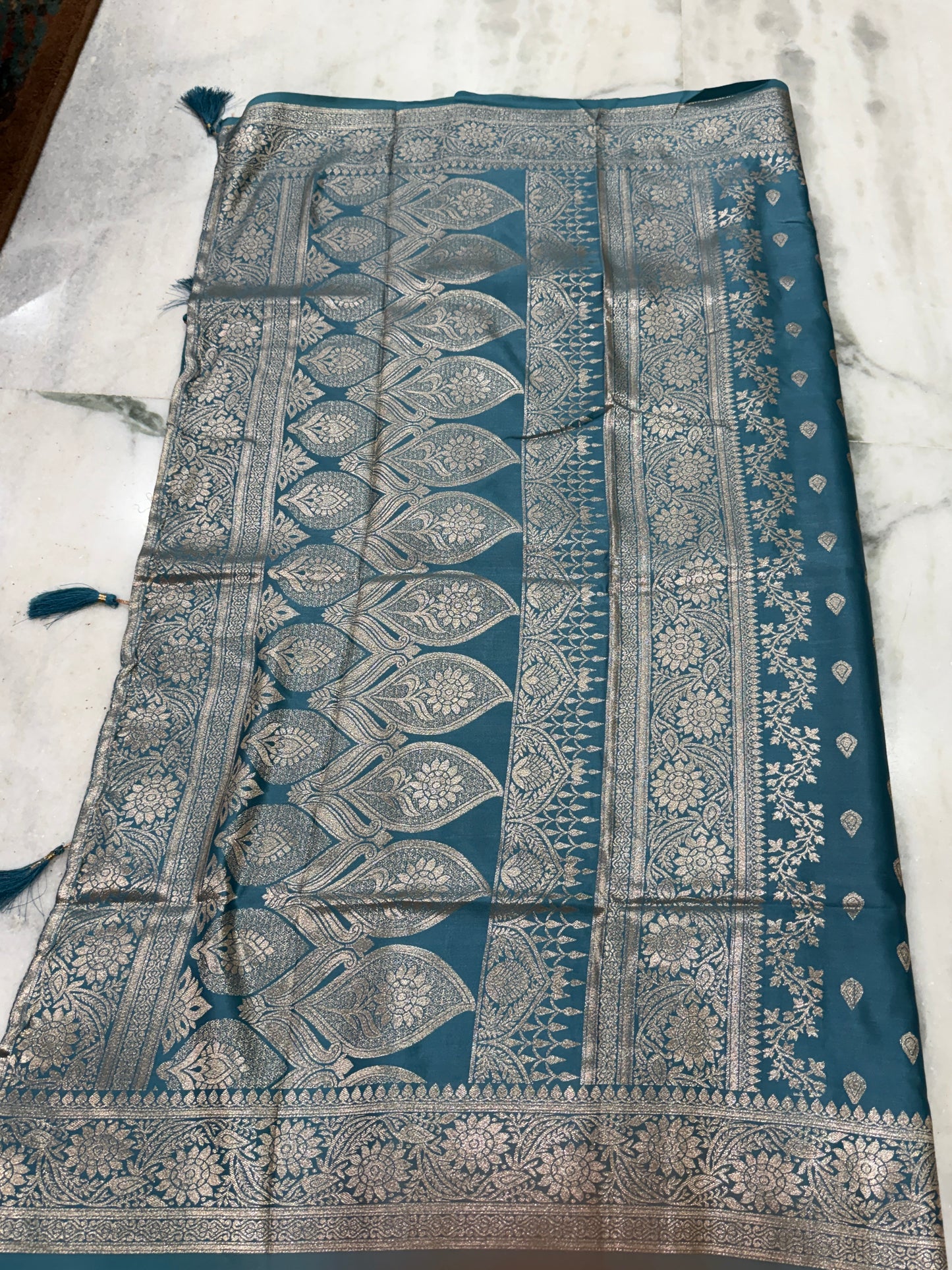 Kaya Kalpo Teal Blue Satin Weave Saree | Gold Zari Booti Body & Large Leaf Woven Pallu | Festive & Bridal Wear