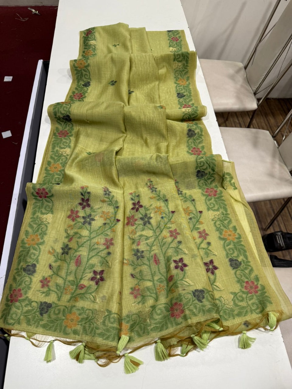 Lime Green Handloom Saree with Fine Weaving Floral Border – Lightweight Body-Hugging Drape