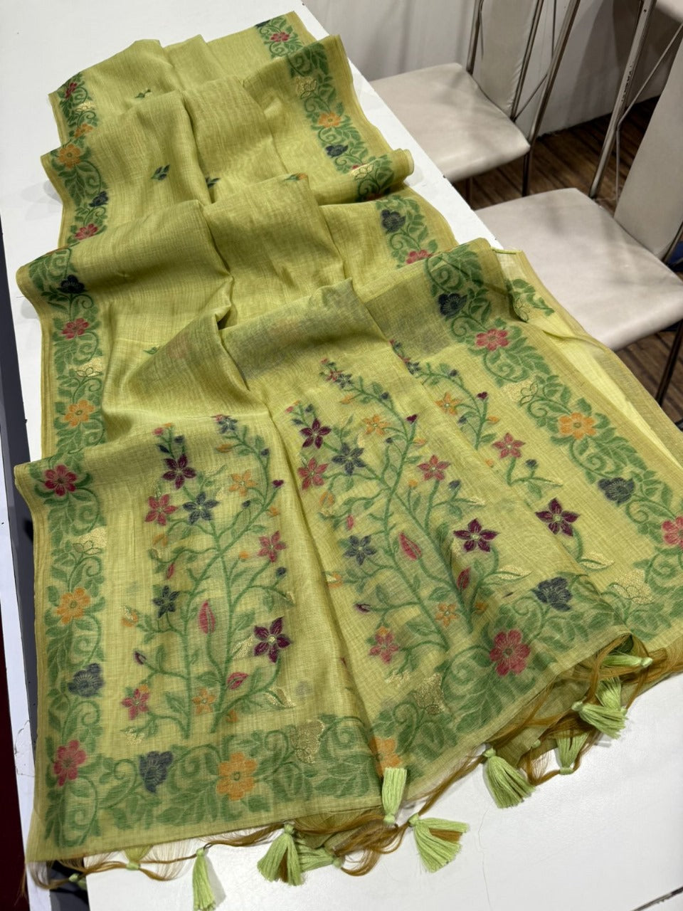 Lime Green Handloom Saree with Fine Weaving Floral Border – Lightweight Body-Hugging Drape